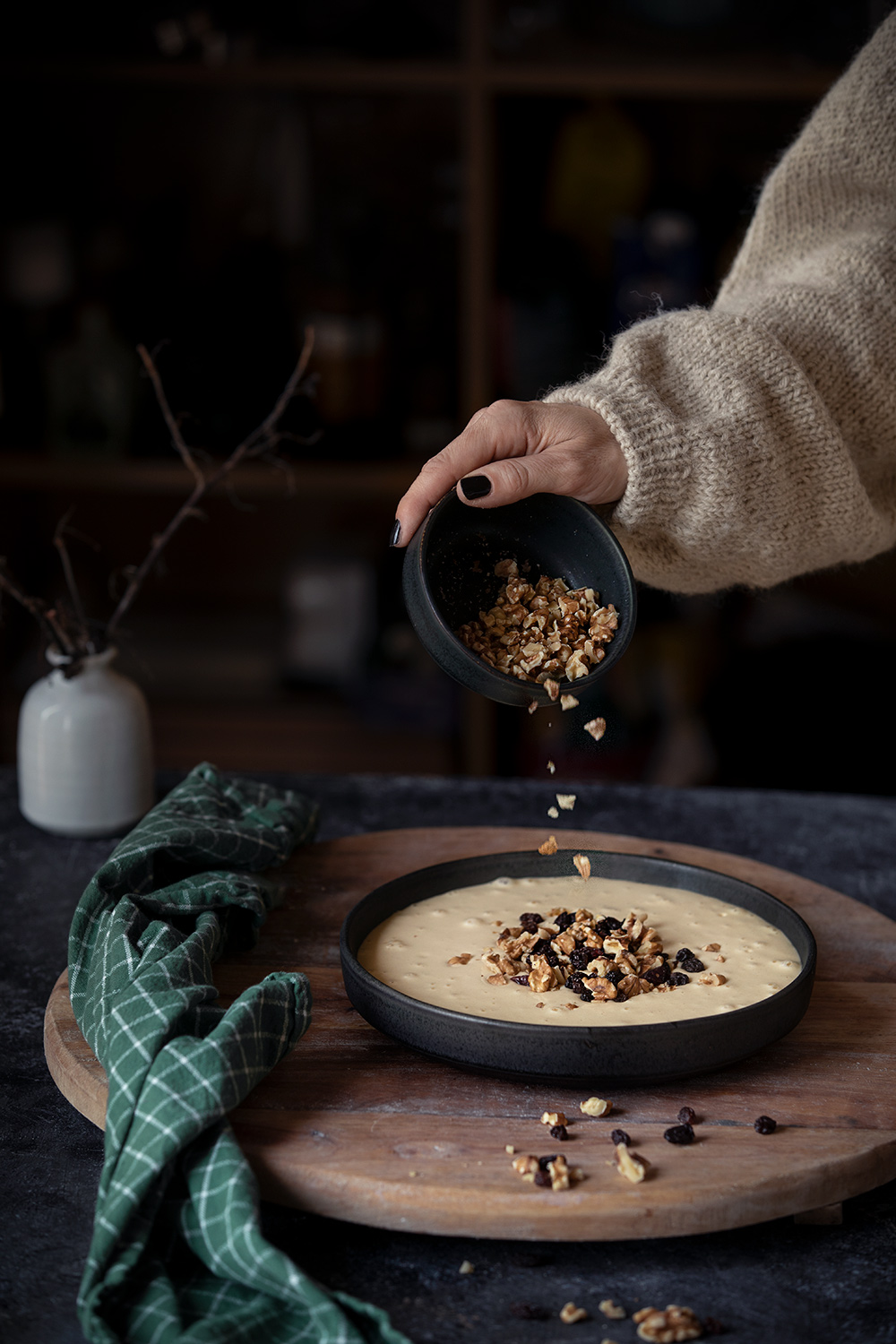Fold in the chopped walnuts and raisins